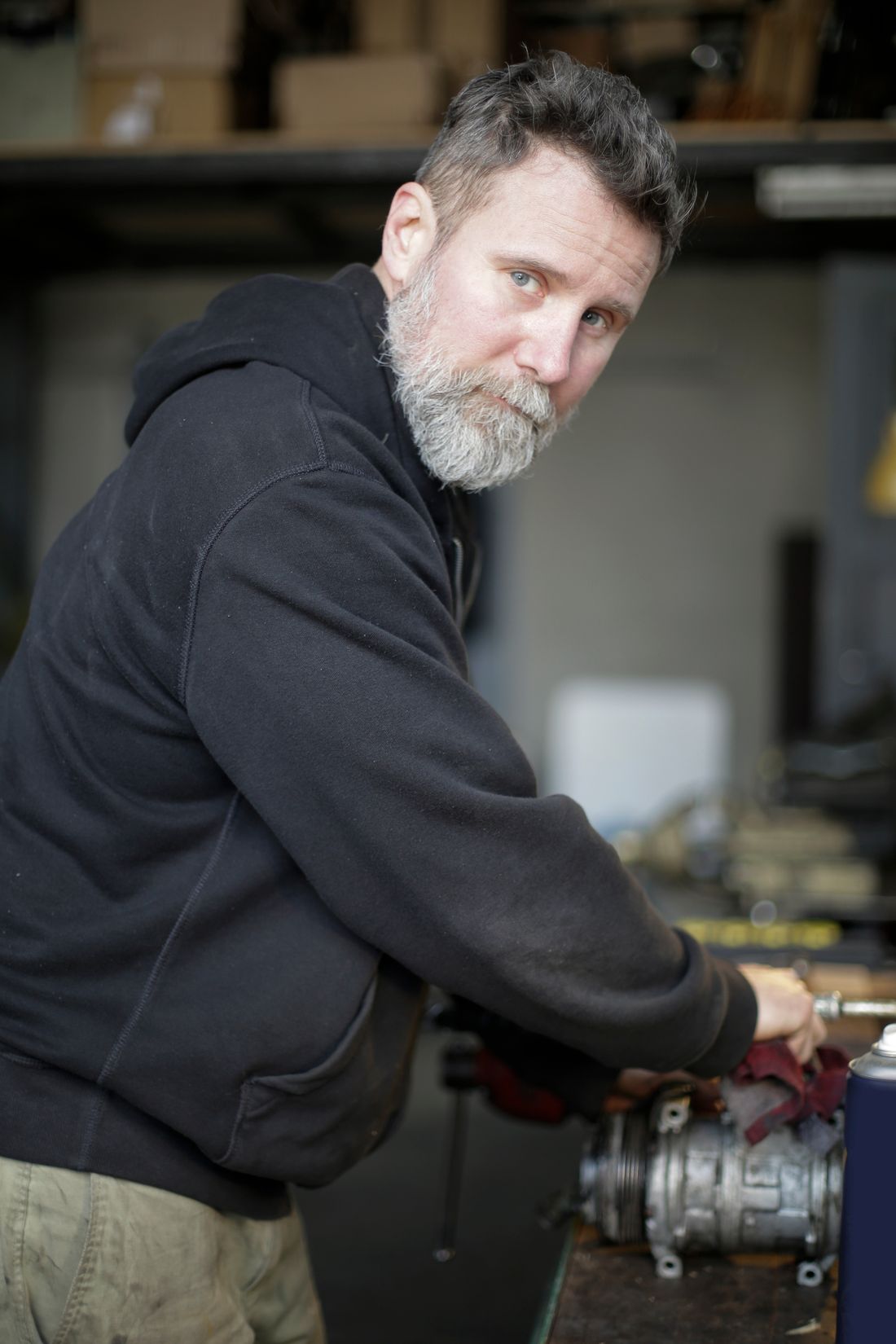 Caleb Harlan, owner of Ironridge Service and Repair, in the shop