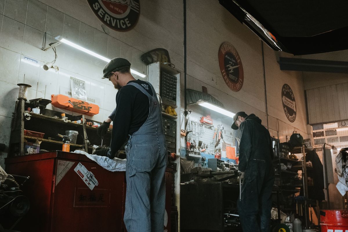 Technicians working together in the shop