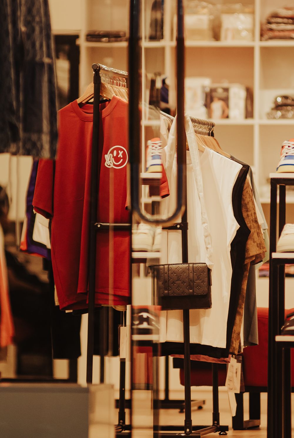 Folded apparel and accessories on a colorful display