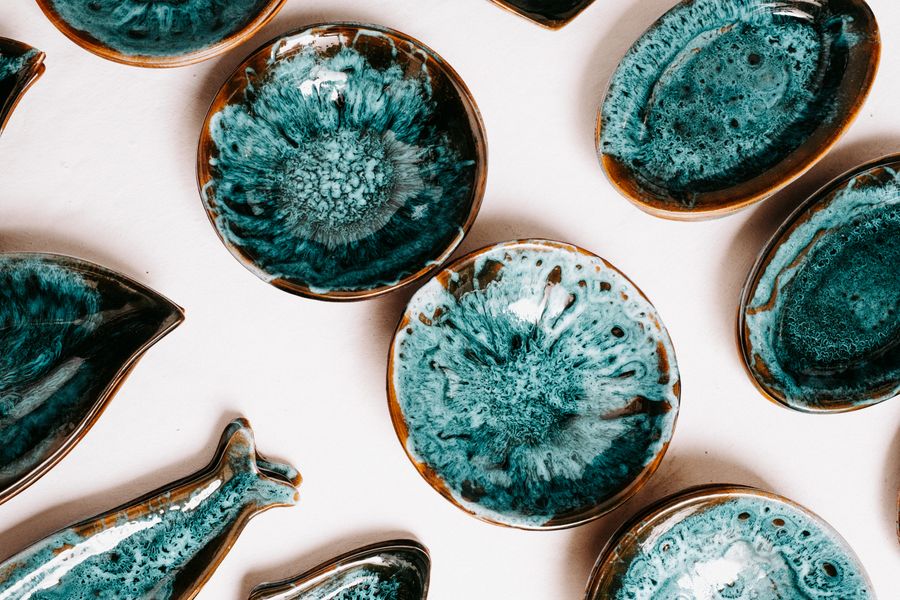 A set of glazed turquoise ceramic bowls