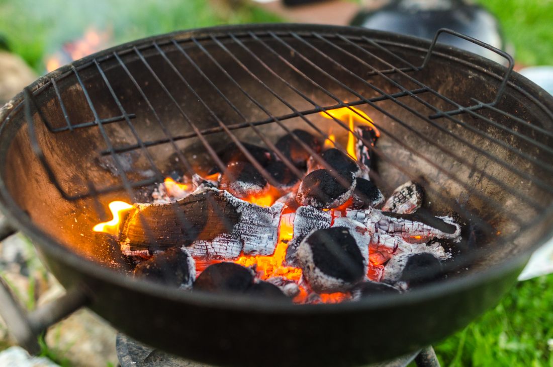 Post oak coals glowing in the firebox.