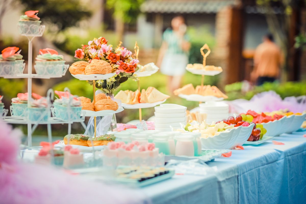 A dessert table set in the garden